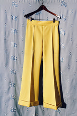 vintage yellow polyester pants with flair and front pleat stretch waistband