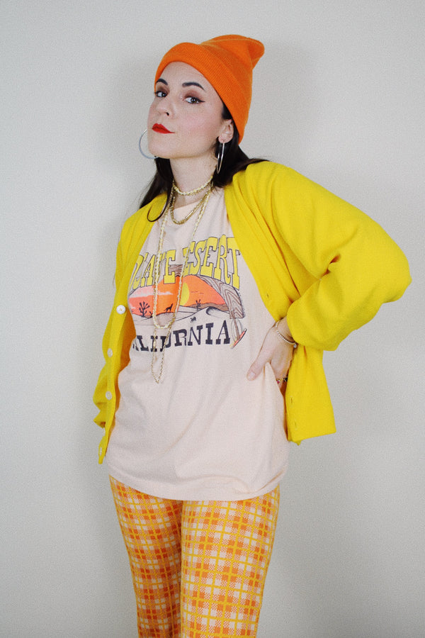 Short sleeve peach colored cotton graphic tee vintage 1990's