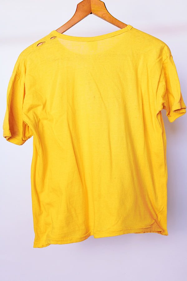 short sleeve yellow cotton vintage t-shirt from 1982 with graphic on front