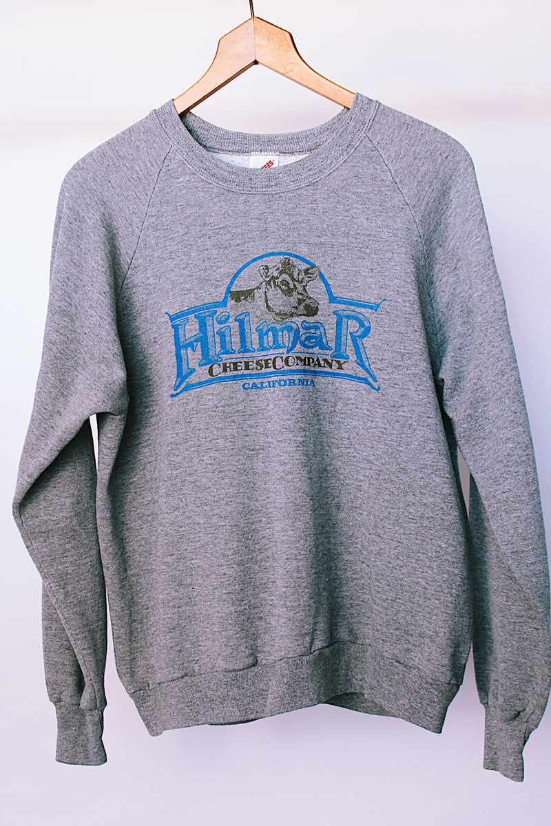 long sleeve grey crew neck sweater with cow graphic on front vintage 1980's