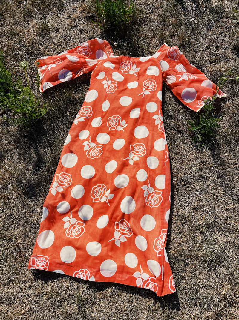 long sleeve bell sleeve orange cotton maxi dress with cream floral and polka dot print vintage 1960's