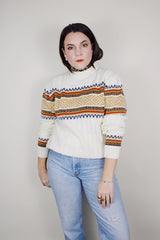vintage 1970's JCPenney long sleeve white cable knit pullover sweater with abstract print around the chest