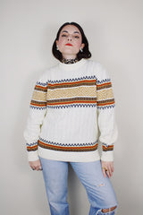 vintage 1970's JCPenney long sleeve white cable knit pullover sweater with abstract print around the chest
