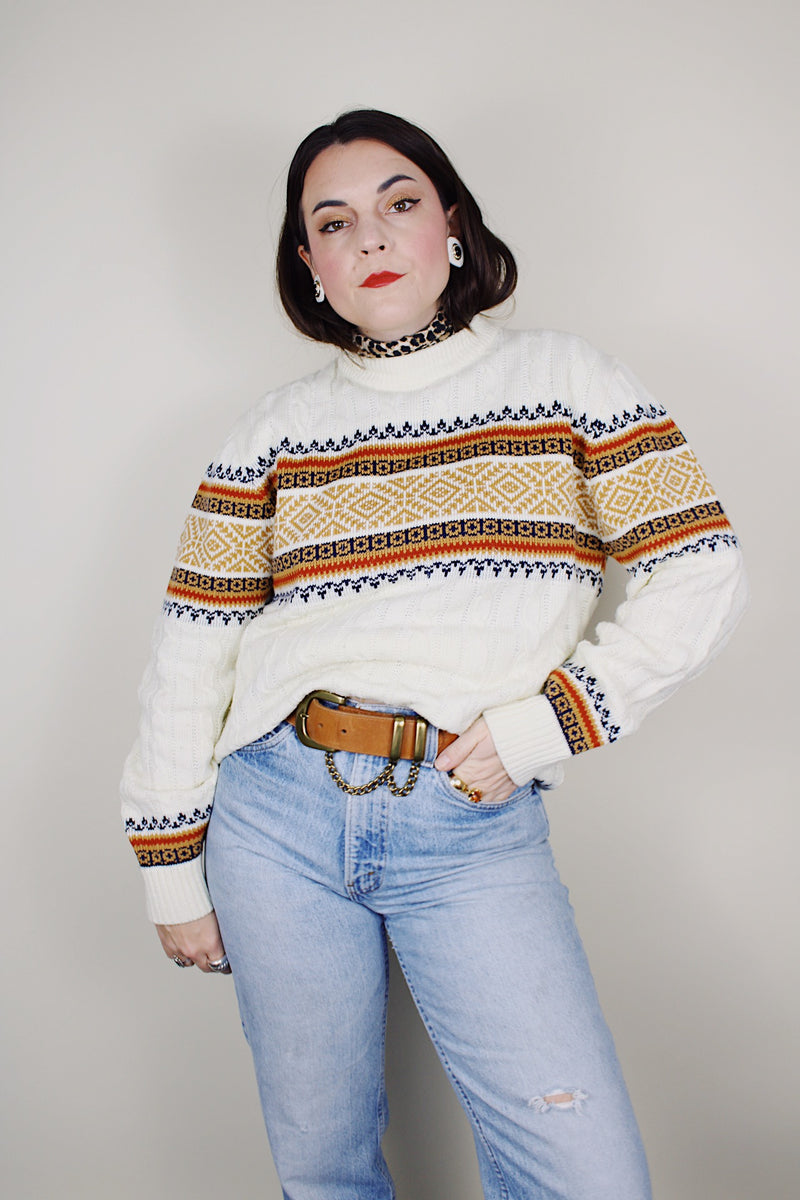  vintage 1970's JCPenney long sleeve white cable knit pullover sweater with abstract print around the chest