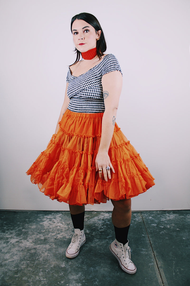 vintage 1960's orange crinoline with layers of sheer ruffled tulle