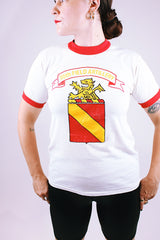 short sleeve white vintage graphic tee with red ribbed neckline and cuffs