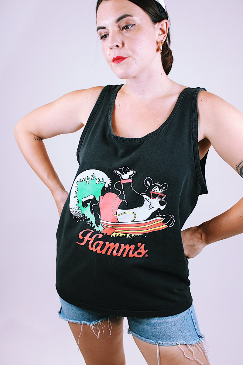 sleeveless oversized black tank top t-shirt with Hamm's on the front and bear surfing 1980's vintage