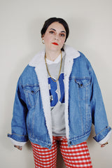 vintage 1980's Levi's San Francisco, Made in USA long sleeve light denim button up jacket with white shearling liner