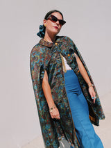 1960's reversible poncho with buttons and collar one side is gold one side is floral print vintage