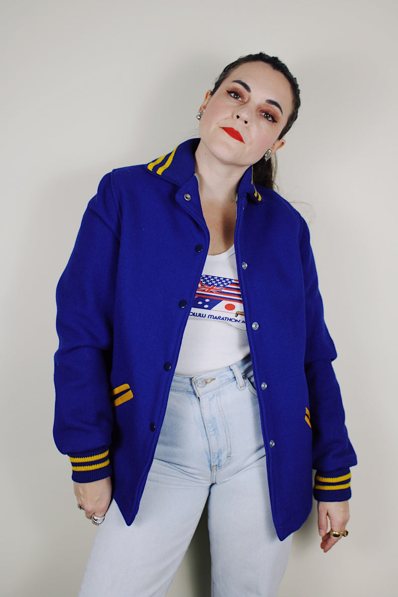 vintage 1950's Quality Knitting Co., Tacoma, Washington label long sleeve wool cobalt blue letterman jacket with yellow striped trim