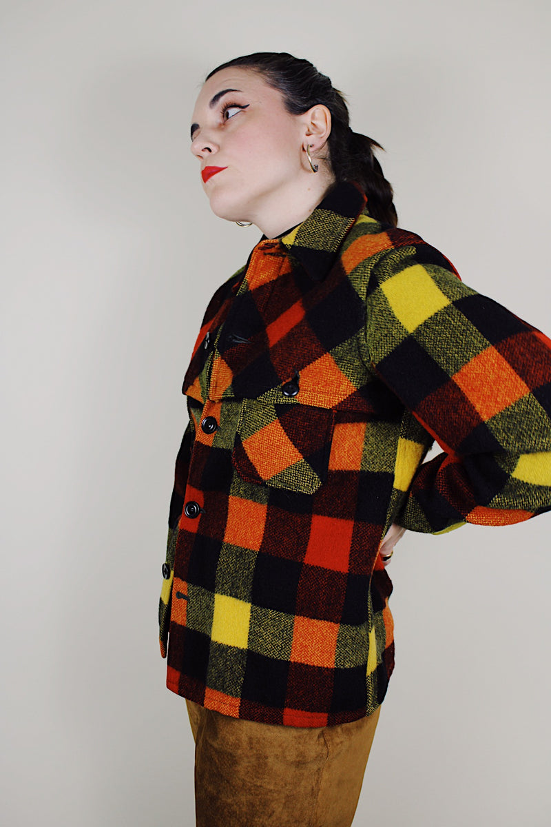 vintage 1940's Montgomery Ward long sleeve wool button up plaid shacket in red, black, and yellow print