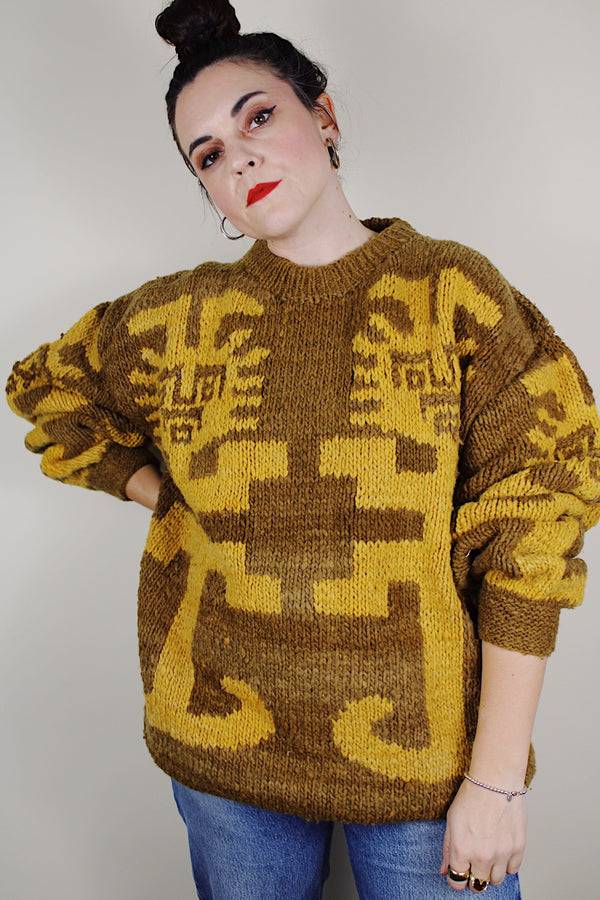vintage 1980's Amano label, hand knit in Equador, XL 100% wool long sleeve pullover sweater in light brown with an all over yellow print