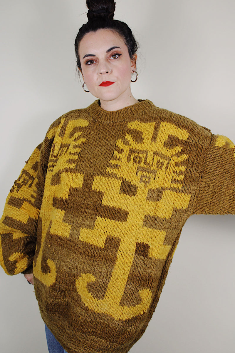vintage 1980's Amano label, hand knit in Equador, XL 100% wool long sleeve pullover sweater in light brown with an all over yellow print