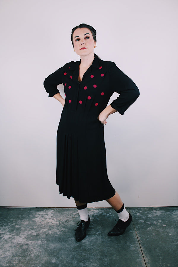 vintage 1940's black midi dress with pink polka dots across chest