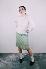 knee length vintage 1960's min colored nylon slip skirt with pleated ruffle hem