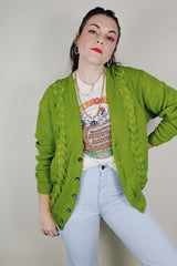 vintage 1960's SKM Penguin, Seattle Knitting Mills label long sleeve green button up wool cardigan with braiding detail on each side and tan leather patches on the elbows