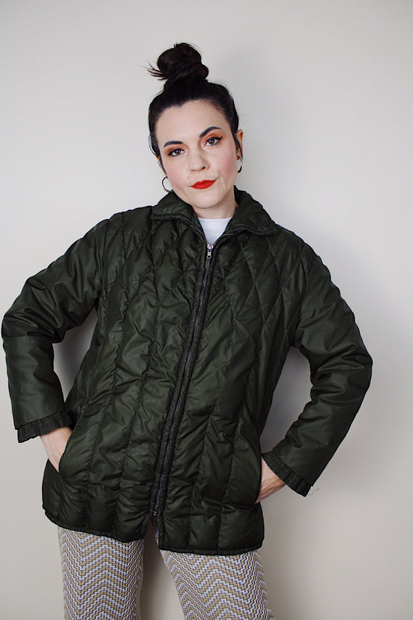 Women's vintage 1970's White Stag, USA label long sleeve olive green nylon quilted puffer jacket with silver zipper up the front