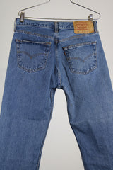 medium wash 501 levi's denim jeans button front closure 33 x 30