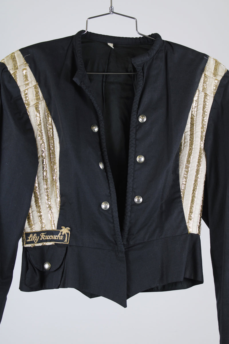 long sleeve black new wave vintage 1980's jacket with decorative stud buttons and gold metallic trim 
