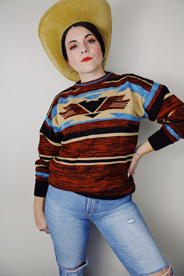 vintage 1970's Montgomery Ward long sleeve acrylic material pullover sweater with a brown, maroon, tan, and blue all over print
