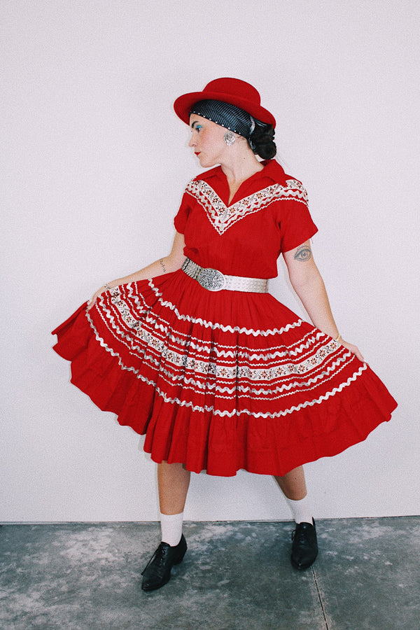 short sleeve red 1960's vintage square dance dress with white and silver ribbon trim all over 