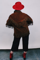 Women's or men's western style vintage 1960's Berco, Minneapolis, Minn. label genuine leather zip up fringe trim jacket in chocolate brown.