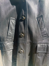 long sleeve black long leather jacket, collar and buttons up the front vintage 1960's