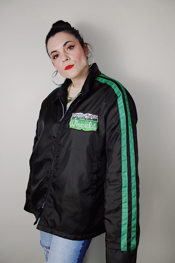  vintage 1980's California label long sleeve brown zip up sports jacket with green stripes on the sleeves in nylon material