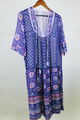 Women's western style vintage 1970's 3/4 arm length midi length boho dress in purple with all over abstract print in sheer lightweight cotton material.