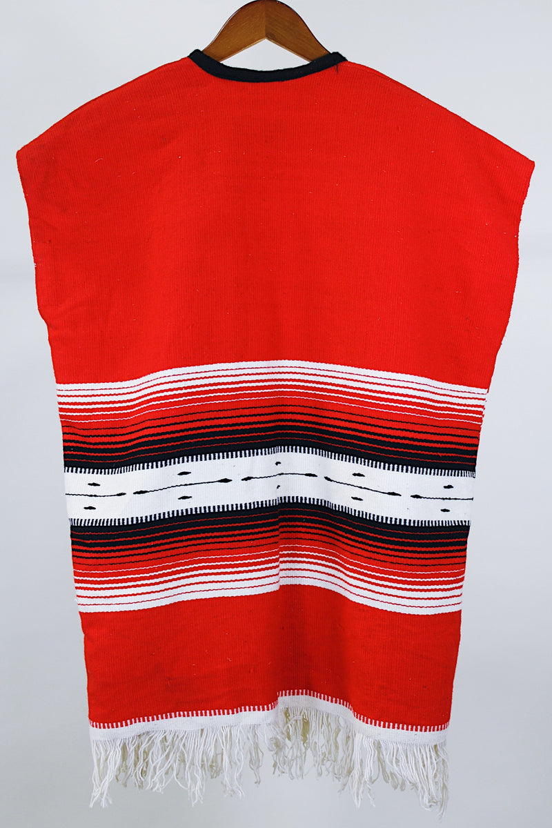 Women's or men's vintage boho western style 1970's sleeveless red wool vest with black trim, cream fringe trim on hem, and black and cream stripes.