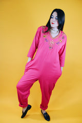 long sleeve hot pink jumpsuit with jewels around neckline and cuffs vintage 1980's