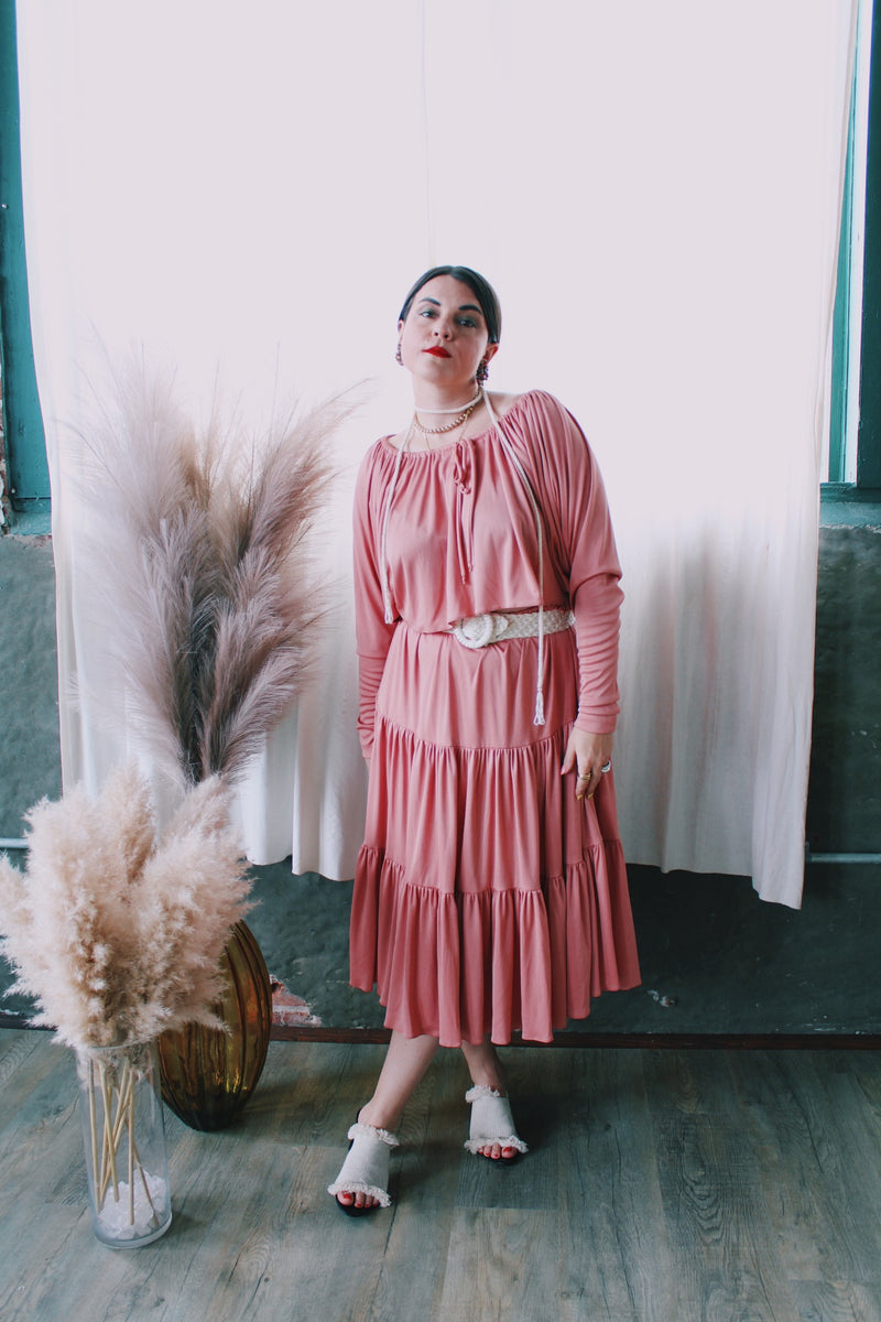 Women's vintage 1970's Joy Stevens California label salmon pink colored matching long sleeve dolman cropped top and pleated midi skirt in polyester material.