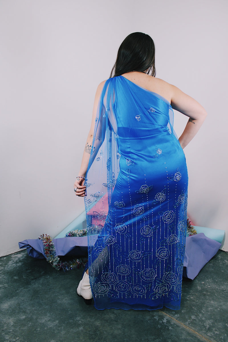 Women's 1980's Alyce Designs label one shoulder sleeveless ankle length bright blue maxi dress with a mesh overlay that has an all over glitter print