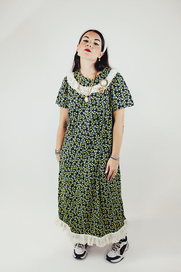 short sleeve ankle length black green and yellow floral printed dress with white eyelet trim vintage 1960's