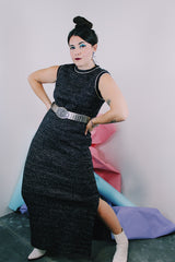Women's vintage 1970's sleeveless ankle length dress in black with all over silver metallic thread. 