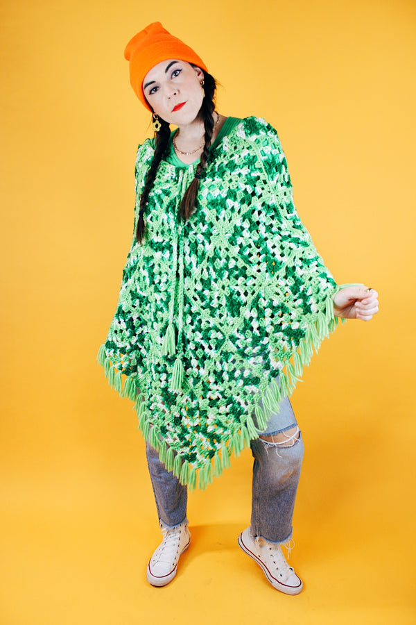 green crochet knit poncho with fringed hem vintage 1970's