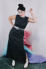 Women's vintage 1970's sleeveless ankle length dress in black with all over silver metallic thread. 