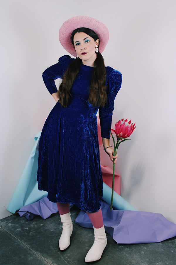 Women's vintage 1960's long sleeve midi length blue velvet dress with slight puff sleeves