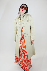 long sleeve knee length light tan trench with gold hardware vintage 1960's saks alley