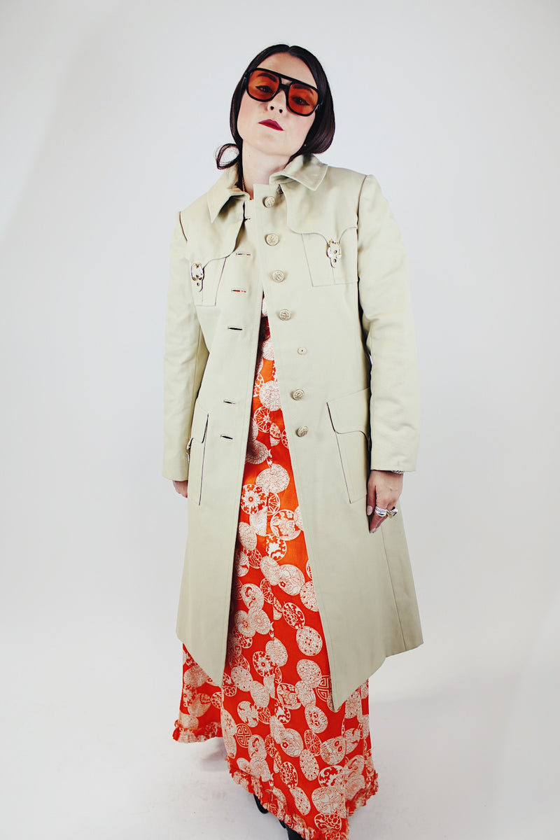 long sleeve knee length light tan trench with gold hardware vintage 1960's saks alley