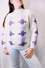 long sleeve white turtleneck vintage 1980's ski sweater in white with purple snowflake print