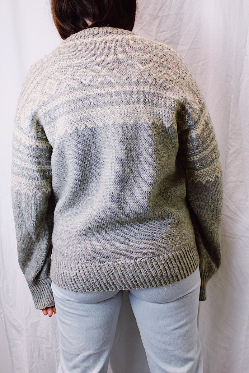 long sleeve grey and cream norwegian sweater vintage with round silver button closure 