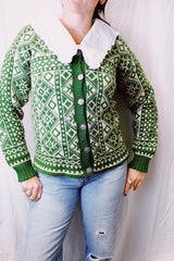 long sleeve norwegian vintage sweater in a green and cream print with silver metal buttons