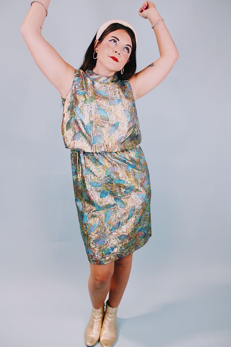 vintage 1960's gold metallic mini sleeveless dress with pink and clue floral pattern underlay 