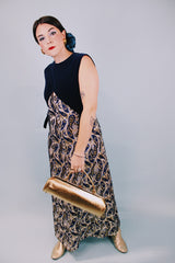 vintage 1970's sleeveless ankle length dress with navy velvet top half and gold metallic paisley printed bottom half