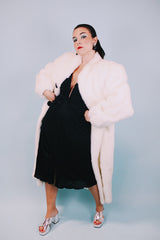 long sleeve ankle length vintage 1980's white faux fur coat with black buttons and mandarin collar