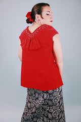 sleeveless red velvet blouse with v neck in front and back with embellished trim around neckline and bow in back 1950's vintage
