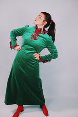 long sleeve ankle length green velvet dress with red tartan ruffles around collar and cuffs 1960's vintage