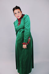 long sleeve ankle length green velvet dress with red tartan ruffles around collar and cuffs 1960's vintage
