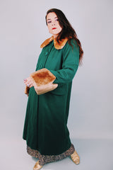 knee length long sleeve wool green coat with brown faux fur collar and trim on cuffs 1940's vintage